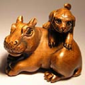 Boxwood Netsuke Dog on Hippo