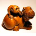 Wood Netsuke Monkey on Hippo