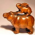 Wood Netsuke Rabbit on Hippo